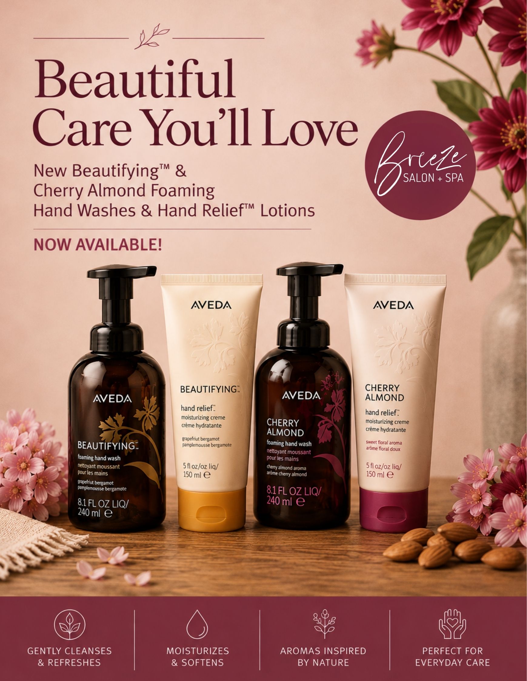 Four Aveda hand wash and lotion bottles are arranged on a table with flower petals, against a pink background with text promoting new scents and benefits.
